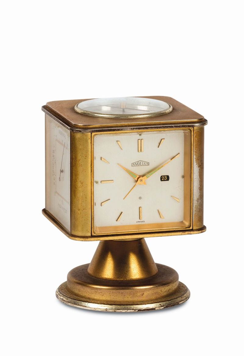 Angelus, desk Weather Station. Fine, gilt brass, four-dialed, eight-day going, keyless revolving desk timepiece with date, hygrometer, barometer and thermometer in Fahrenheit and Centigrade. Made circa 1970  - Auction Watches and Pocket Watches - Cambi Casa d'Aste