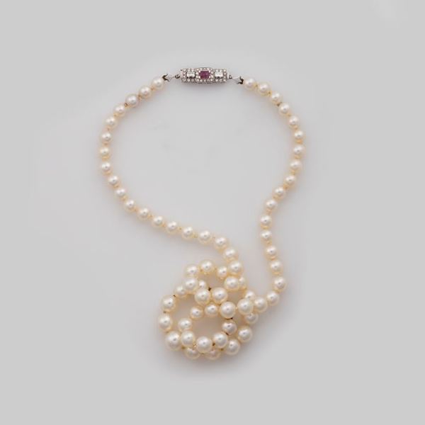 Cultured pearl necklace, the clasp set with diamond and ruby