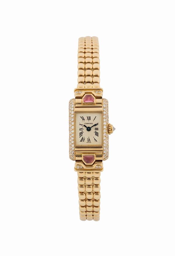 CARTIER, TANK LADY'S QUARTZ YELLOW GOLD AND DIAMOND,  case No. 8280030898. Fine and elegant, rectangular, 18K yellow gold and diamonds quartz lady's wristwatch with an 18K yellow gold Cartier link bracelet with concealed double deployant clasp. Accompanied by the original Guarantee. Made in the 1990's