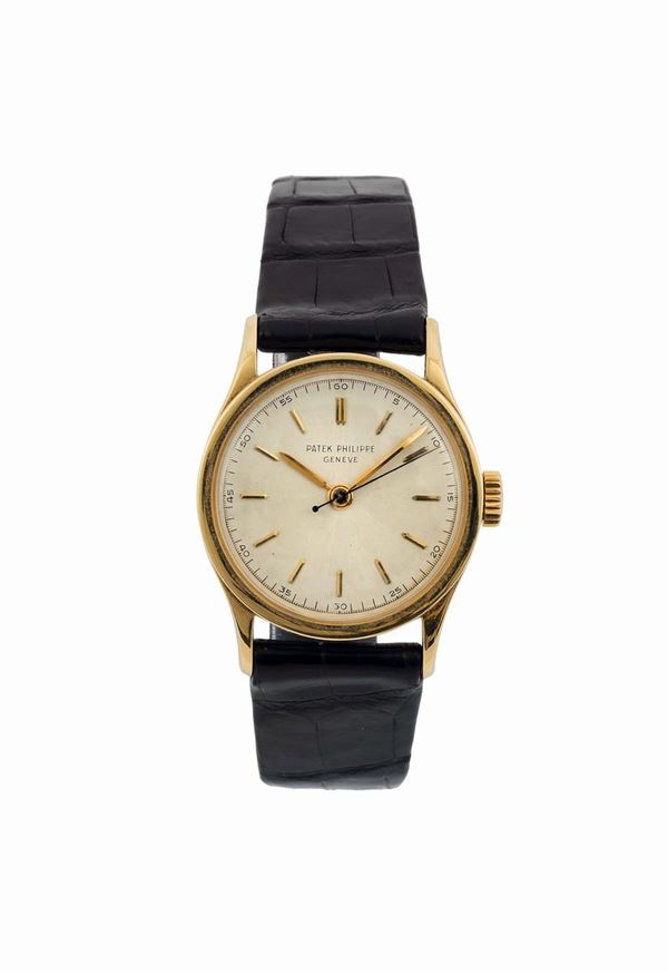 Patek Philippe, Genève, Calatrava, Ref. 2457. Very fine and rare, center-seconds, 18K yellow gold wristwatch with an 18K yellow gold original buckle. Made circa 1950