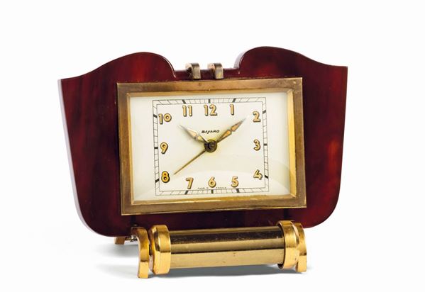 BAYARD, gilt brass and bakelite desk clock with lamp. Made circa 1960