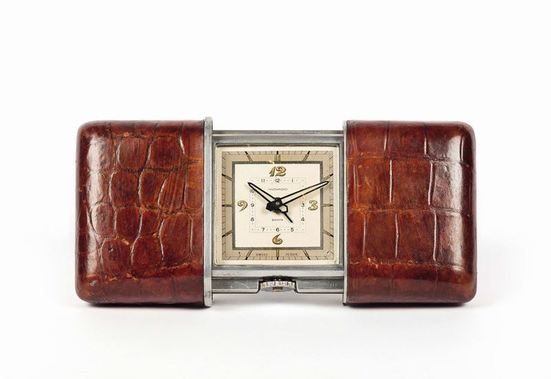 MOVADO, Ermeto Big Pulmann, case No. 711672. Rare and big leather covered extensible travel clock  with 8 days power reserve and alarm. Made circa 1940  - Auction Watches and Pocket Watches - Cambi Casa d'Aste