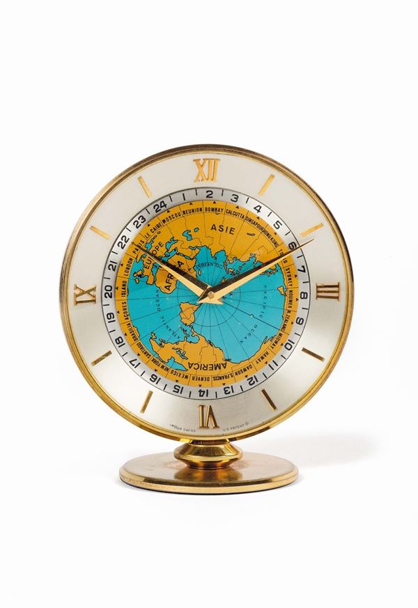 IMHOF, World Time Clock, Swiss 1488361.  Piccolo orologio da tavolo, con riserva di carica  8 giorni e ore del mondo. Realizzato circa nel 1950