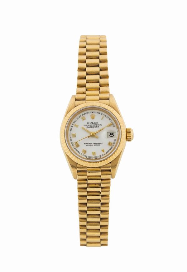 ROLEX , Oyster Perpetual, Datejust, Superlative Chronometer, Officially Certified, case No. 8777750 Ref. 69178. Fine, center seconds, self-winding, water resistant, 18K yellow gold lady's wristwatch with date, and an 18K yellow gold Rolex President bracelet with concealed deployant clasp. Accompanied by extra links. Made circa 1984.