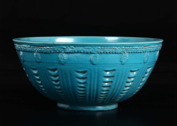 A light blue-ground porcelain bowl with decoration in relief, Perisa, 19th century