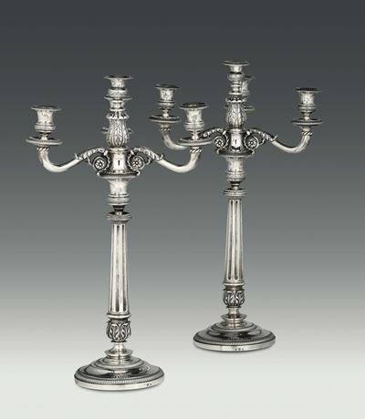 Due Candelabri a Quattro Fiamme in Argento Fuso, Sbalzato e Cesellato, Genova, XIX Secolo. Bolli ...
