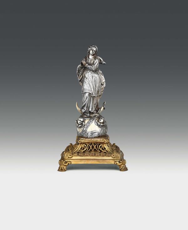 A statuette depicting the Immaculate Conception in silver and copper, gilded and perforated, Naples, 19th century