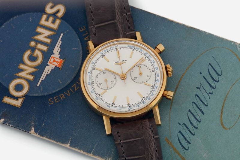 LONGINES, REF. 7415, movement No. 117022.16. A fine and very rare 18K yellow gold fly-back chronograph wristwatch with tachymetre scale and original buckle. Made in the late 1960's. Accompanied by the original box and Guarantee  - Auction Watches and Pocket Watches - Cambi Casa d'Aste