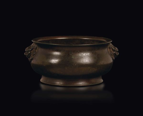 A bronze censer with mask handles, China, Ming Dynasty, 17th century