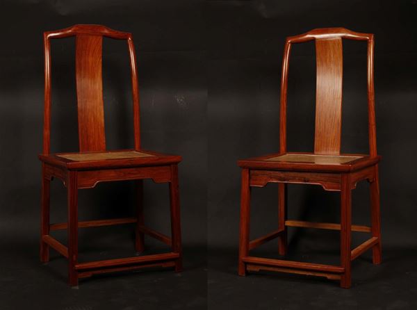 A pair of huanghuali high continuous yokeback chairs, China, 20th century