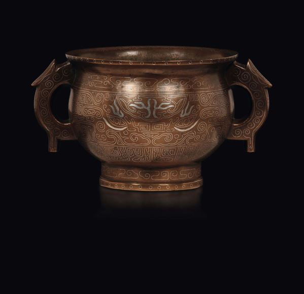 Incensiere in bronzo con decoro d'ispirazione arcaica con maschera taotie in intarsio d'argento , Cina, Dinastia Ming, XVII secolo
