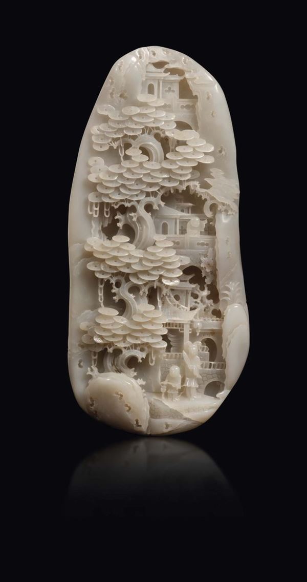 A finely carved white jade mountain with landscape and figures, China, early 20th century