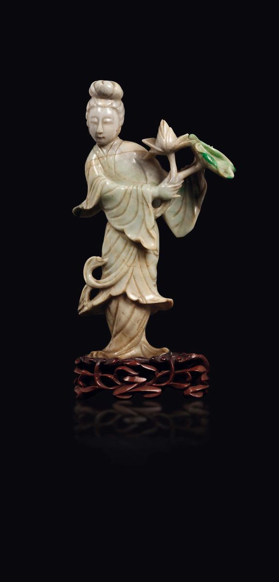 A jadeite figure of Guanyin with lotus flower, China, 20th century