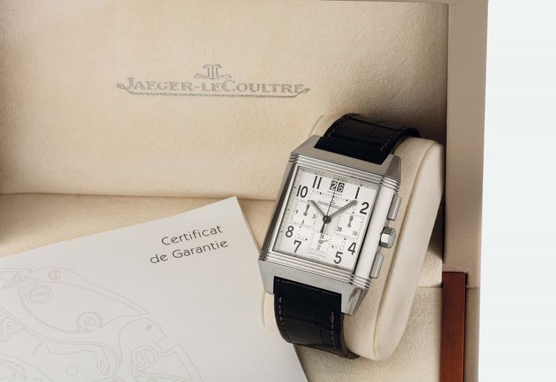 JAEGER LECOULTRE, REVERSO SQUADRA CHRONOGRAPH GMT STEEL, Ref. 230.8.45. Fine, large, rectangular and reversible, stainless steel, self-winding, water-resistant, two-time-zone wristwatch with square-button chronograph, registers, large double date and a stainless steel Jaeger LeCoultre double deployant clasp. Accompanied by a Jaeger-LeCoultre  box, Guarantee and Instruction manual. Made circa 2010  - Auction Watches and Pocket Watches - Cambi Casa d'Aste