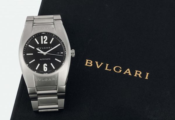 BULGARI, ERGON STEEL  AUTOMATIC, Ref. EG 40 S. Fine, tonneau-shaped, curved, water-resistant, stainless steel wristwatch with date and a stainless steel Bulgari bracelet with double deployant clasp. Accompanied by a box, instructions and Guarantee. Made circa 2004