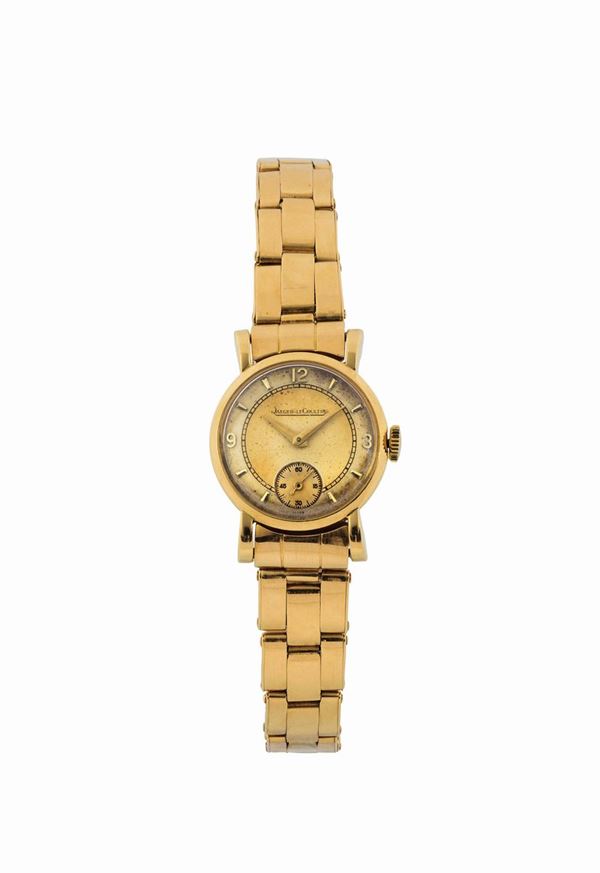 JAEGER LeCOULTRE, case No. 35 0405, fine, 18K yellow gold lady's wristwatch with gold riveted elastic bracelet and deployant clasp. Made circa 1950