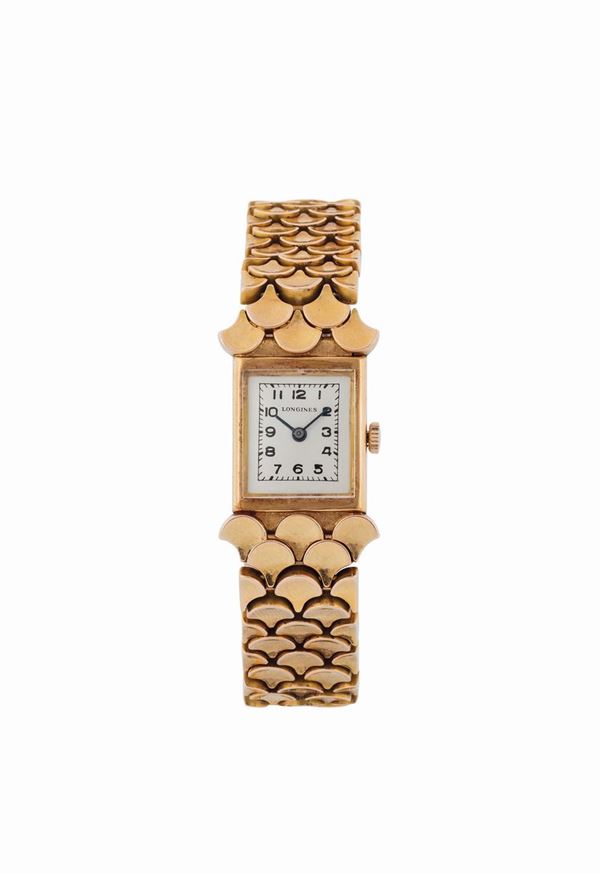 LONGINES, elegante, orologio da polso, da signora in oro giallo 18K con bracciale a squame di serpente. Realizzato nel 1960 circa
