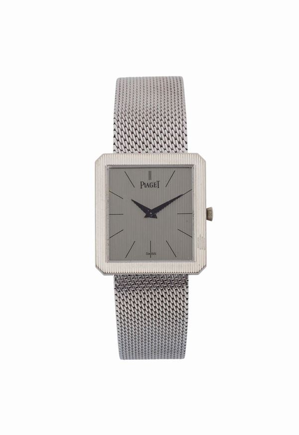 PIAGET, Ref. 9154, 18K white gold square shaped wristwatch with gold integrated bracelet with deployant clasp. Made circa 1960