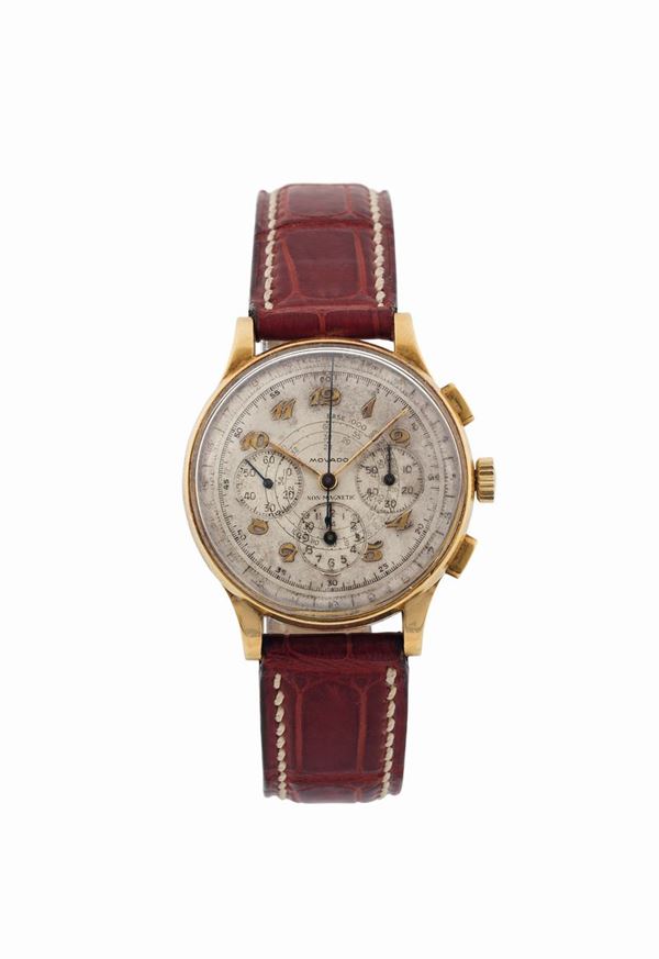 Movado, Ref. 9020,  fine and rare, 18K yellow gold chronograph wristwatch with registers, telemeter and tachometer. Made in the 1940's