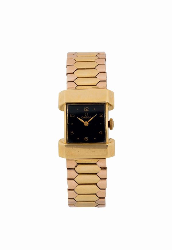 OMEGA, Ref.10461, elegante orologio da polso, da signora, in oro giallo 18K con bracciale in oro giallo. Realizzato nel 1944.