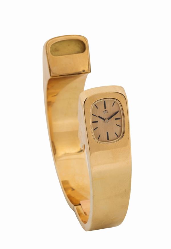 UTI, Paris, for Fasano Jewelry, case No.7434, exceptionally fine and rare, 18K yellow gold topwinding lady's wristwatch with original gold integrated bracelet. Made circa 1970