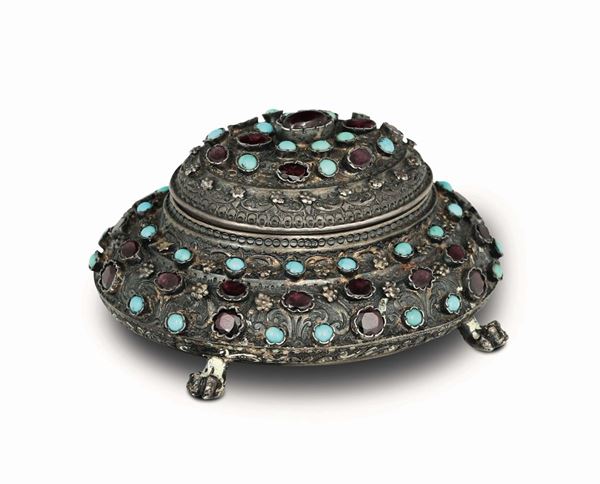 A casket in molten, embossed, chiselled, gilded silver, with turquoise and garnet stones, Austro-Hungarian empire, city of Pest stamps in use from 1867 to 1921