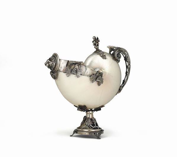A Nautilus with a frame in molten, embossed and chiselled silver, Italy 20th century