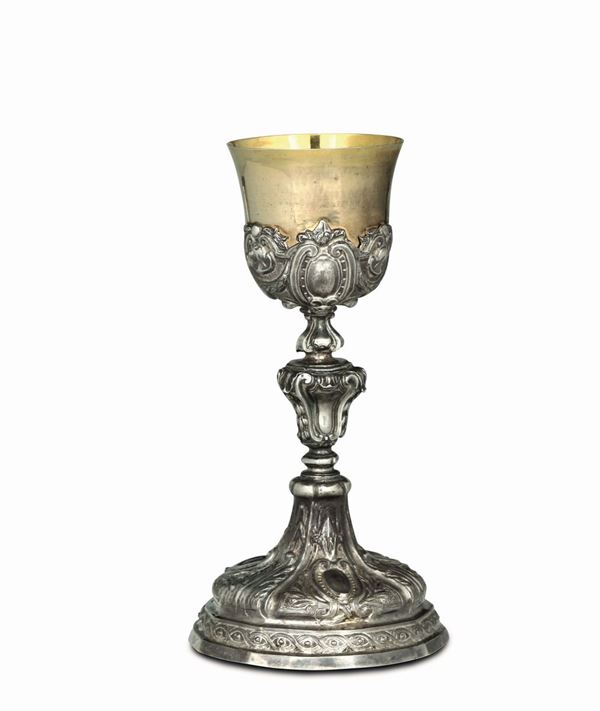 A goblet in embossed and chiselled silver, Rome, last quarter of the 18th century, worn-out Roman cameral stamp