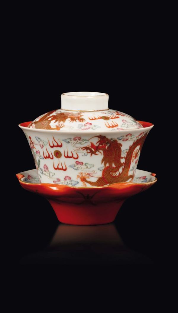 A polychrome enamelled porcelain cup and cover with dish with dragon and phoenix, China, Qing Dynasty, Guangxu Mark and of the Period (1875-1908)