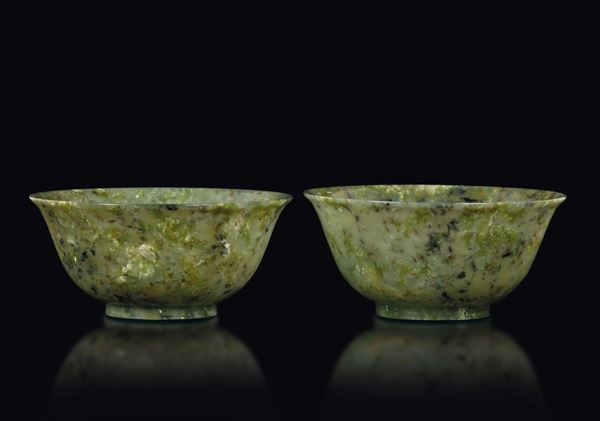 A pair of green jade bowls, China, Qing Dynasty, late 19th century