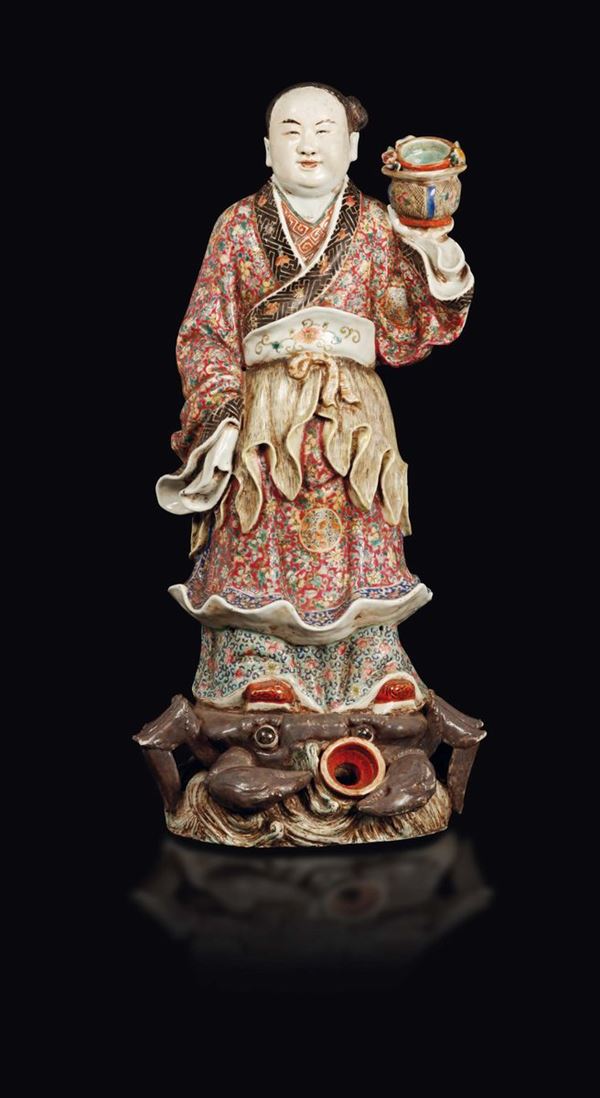 A polychrome enamelled porcelain figure of a dignitary, China, Qing Dynasty, late 19th century