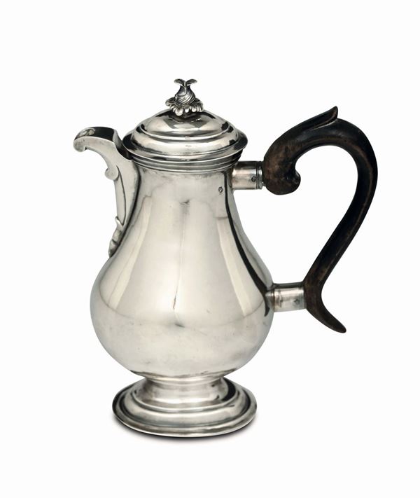 A coffee pot in molten, embossed and chiselled silver, Austro-Hungarian manufacture from 1776, silversmith MPK