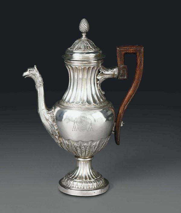 A coffee pot in embossed and chiselled silver, Rome, cameral stamp for 1799 - 1808 and mark for silversmith Carlo Sciolet (1801 - 1830)