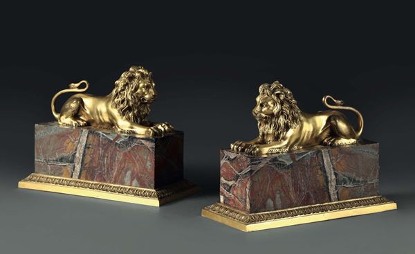 A pair of lions in gilt bronze, France 19th century