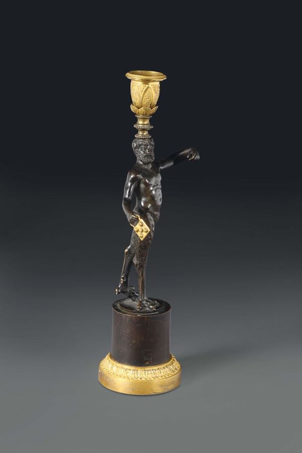 A bronze candle holder with faun, France 19th century