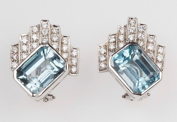 Pair of blue topaz and diamond earrings