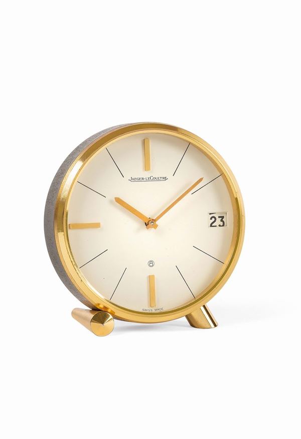 Jaeger LeCoultre, orologio da scrivania, in ottone dorato con datario e riserva di carica. Realizzato nel 1960 circa