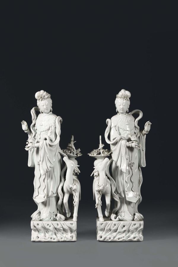 A pair of Guanyin with deer in Blanc de Chine porcelain, China, Qing dynasty, 19th century
