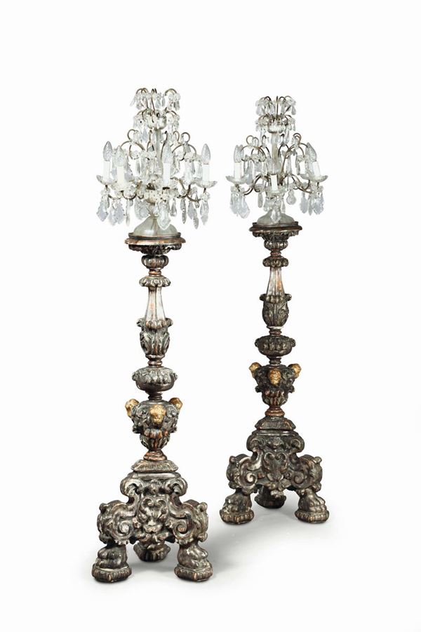 A pair of torch holders with girandoles, 18th century