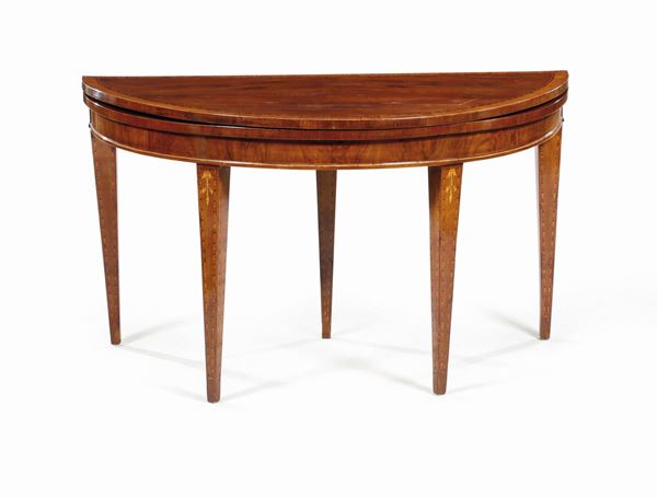 A Directoire mahogany table in the shape of a half-moon, 18th-19th century
