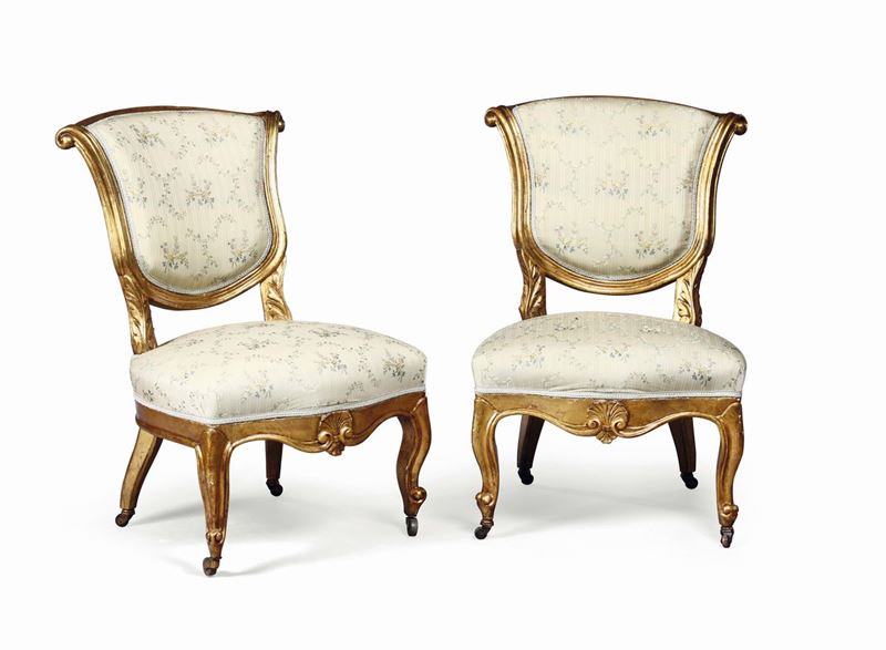 A pair of chimney chairs in carved and gilt wood, 18th century  - Auction Taste, Furniture and Residences, An Italian Collection - Cambi Casa d'Aste