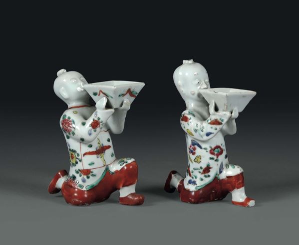 A pair of offering figures in polychrome porcelain, China, Qing dynasty, 19th century