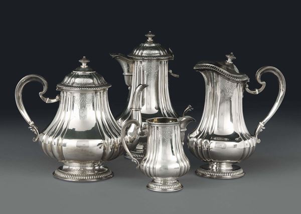 A set of four pieces in molten, embossed and chiselled silver. Cardeilhac (Paris), 19th century, unidentified silversmith's mark.