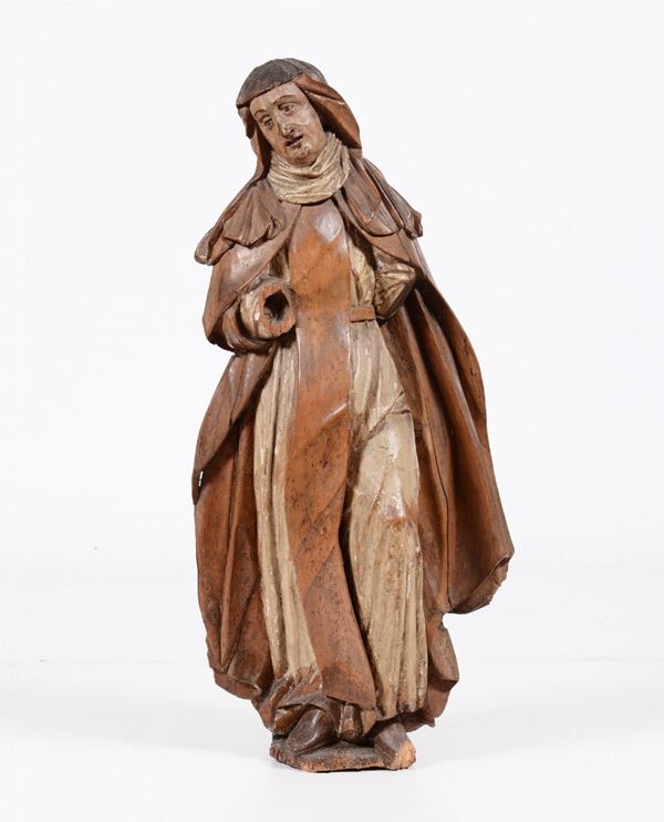 A polychrome wood sculpture of a Saint, Italy or Spain, 16th - 17th century