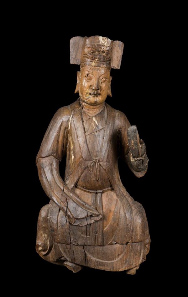 Figura di dignitario seduto scolpito in legno con iscrizione sul retro, Cina del Sud, Dinastia Ming, XVII secolo