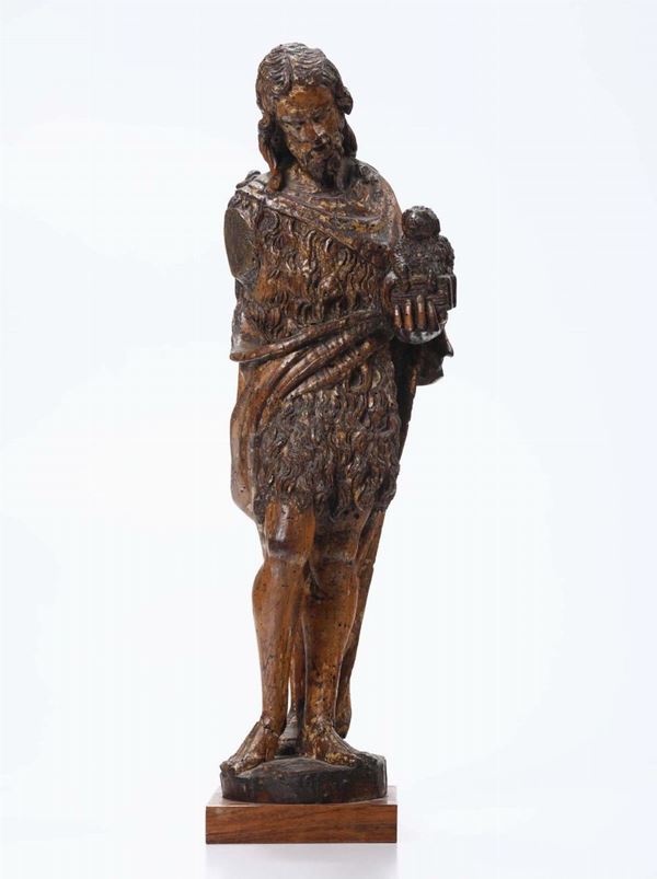 A wooden sculpture depicting Saint John the Baptist, Italian art from the 16th century