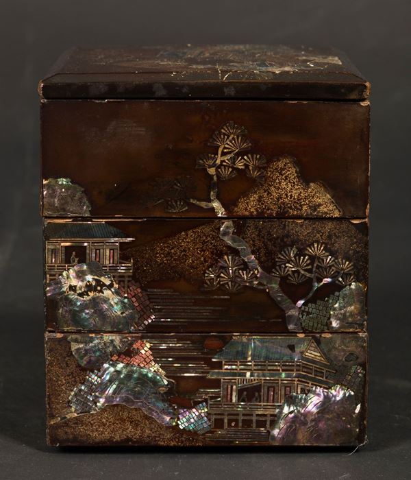 A lacquered wood bento with landscapes, China, Qing Dynasty, 19th century