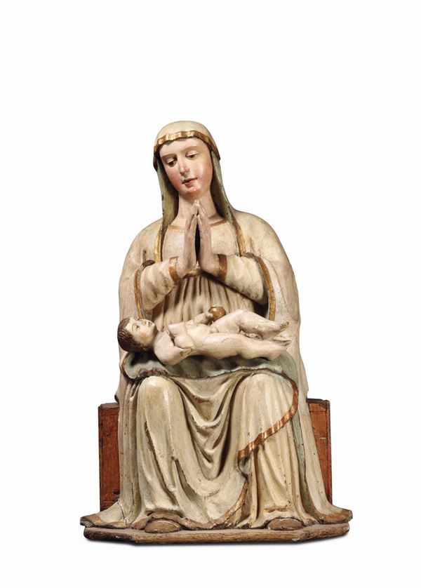 A Madonna and child in carved, painted and gilt wood. Veronese sculptor from the beginning of the 16th century, close to Giovanni Zabellana.