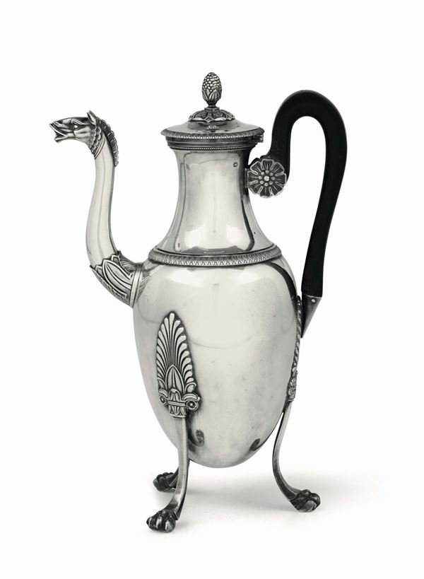 A coffee pot in first-title silver, embossed and chiselled and handle in ebanized wood, Paris first quarter of the 19th century. Title marks in use from 1809 to 1819 and mark for silversmith GR (unidentified).