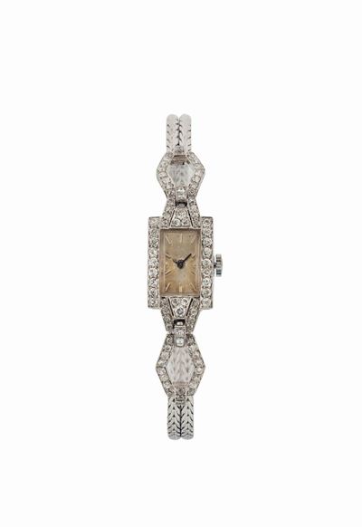 Universal Geneve, Orologio da Ploso, in Oro Bianco 18k con Bracciale Integrato in Oro. Realizzato...